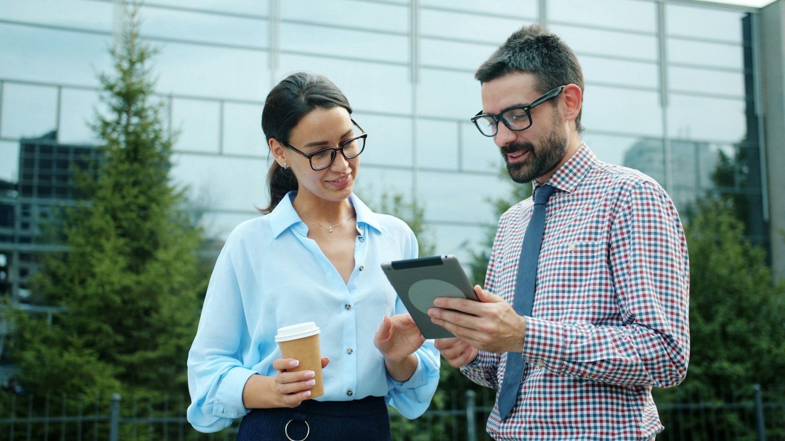 Two professionals meeting in a modern office
